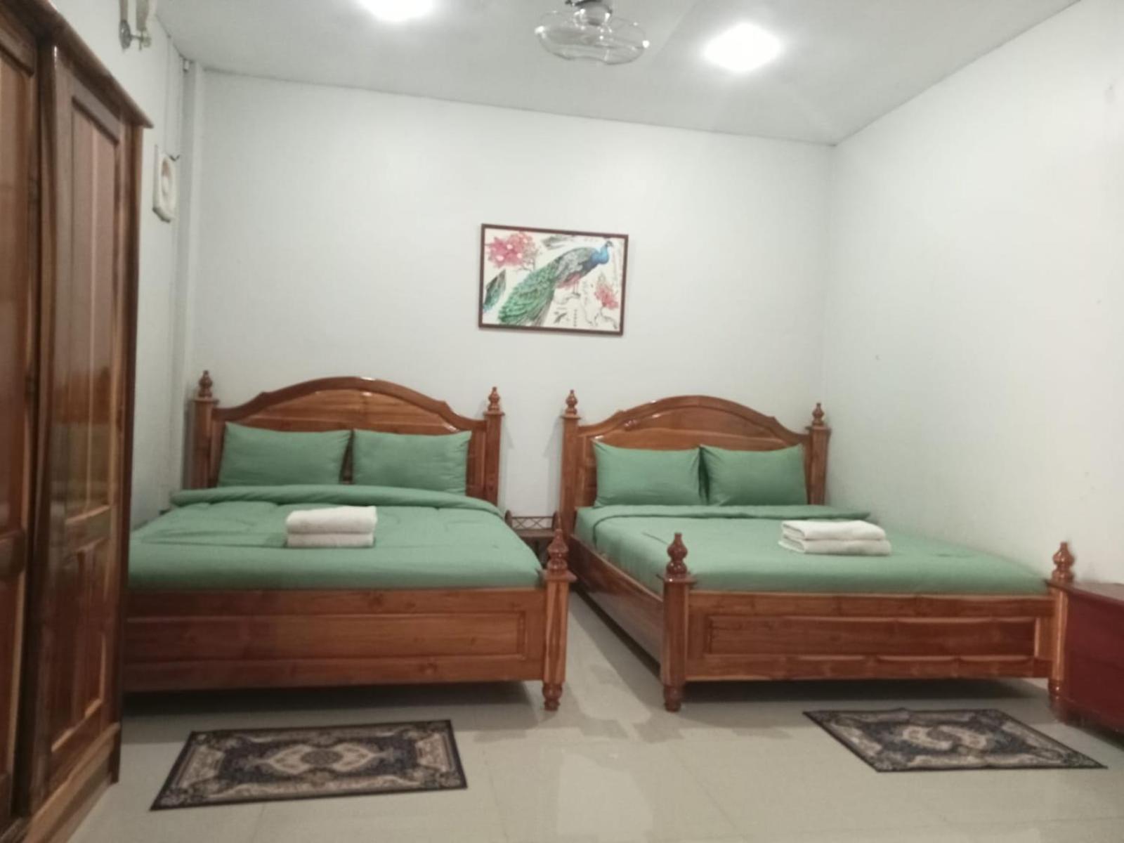 Erawan Guesthouse Pakxé Exteriör bild